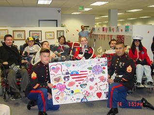 Sgt Todd Fox with quadrapalegic kids