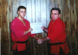 Todd Fox with Martin of Centurion in 1995 New Black Belt