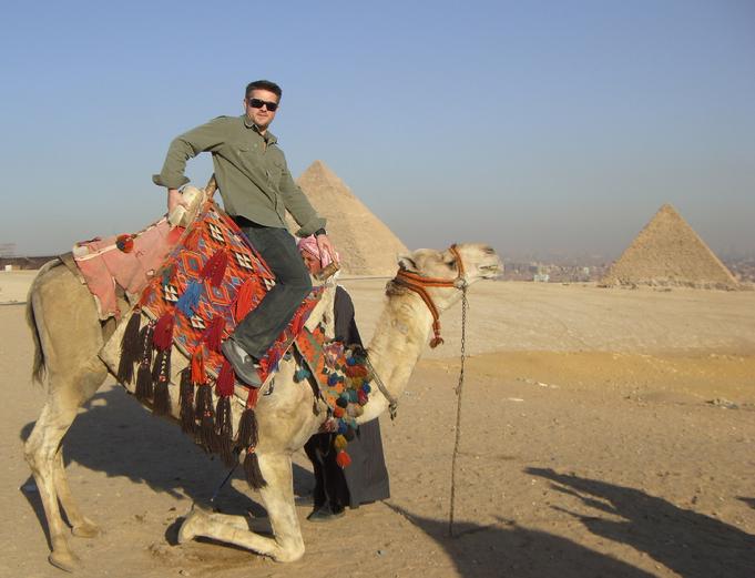 Todd Fox Ridding a camel like a bull
